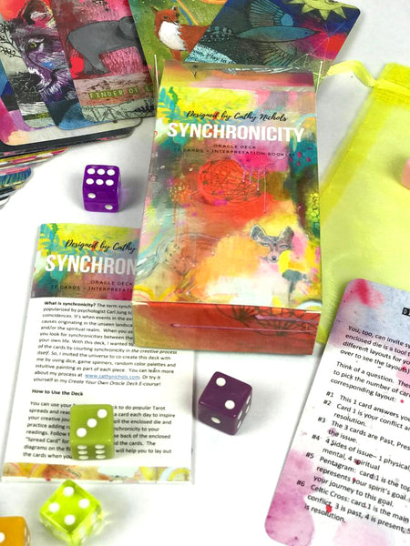 The Synchronicity oracle deck by artist Cathy Nichols