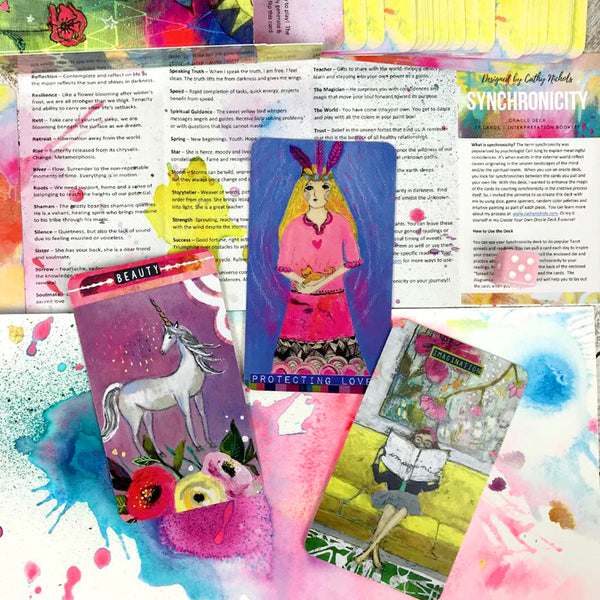 The Synchronicity oracle deck by artist Cathy Nichols